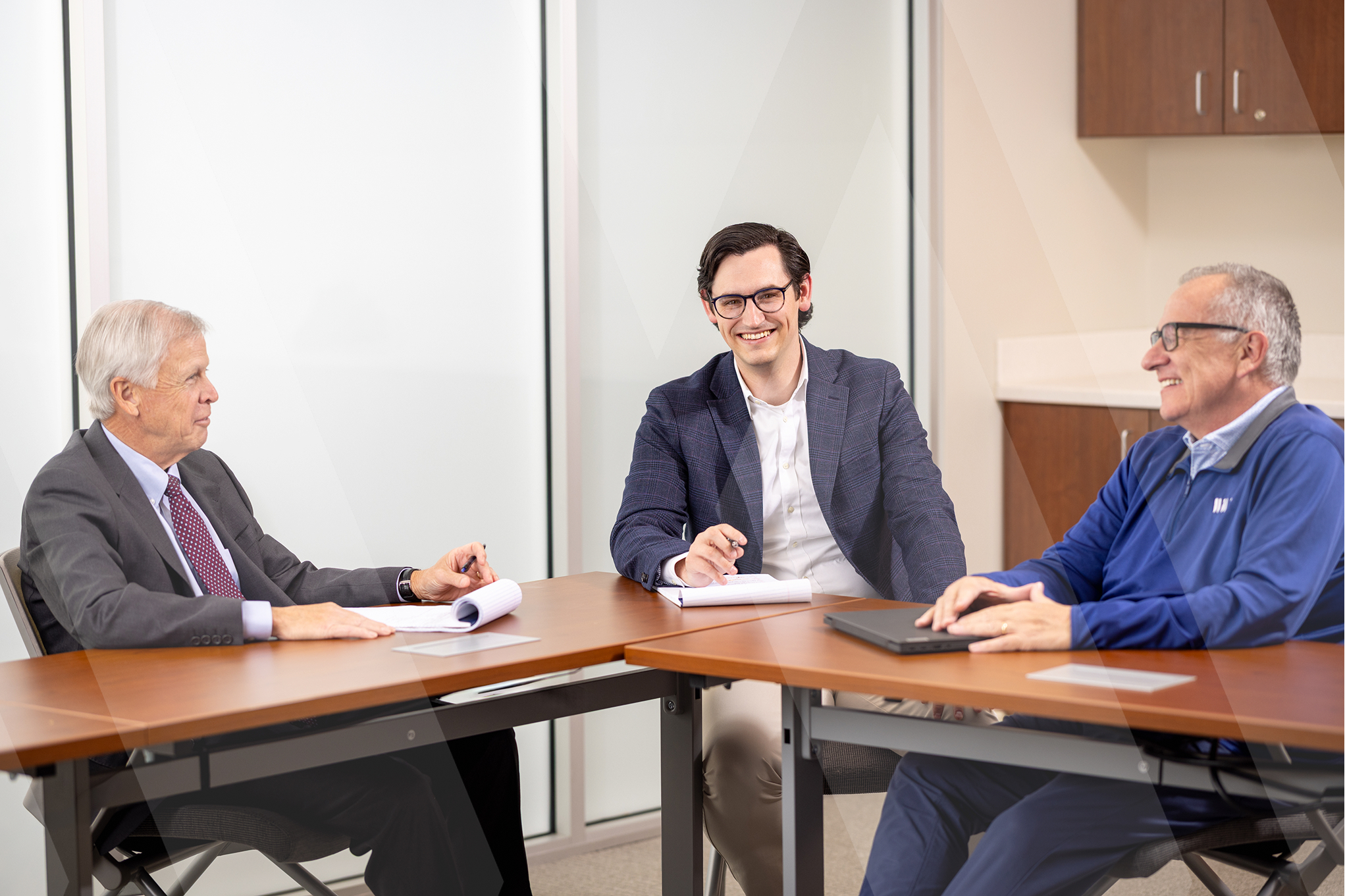 3 lawyers talking to each other