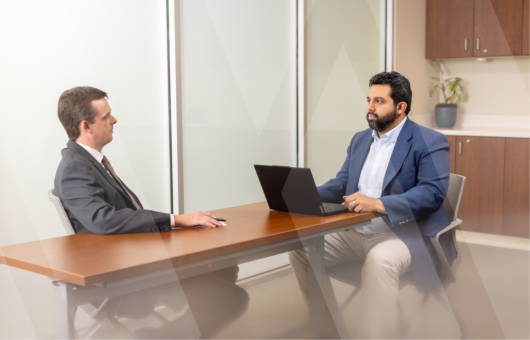 two law firm lawyers talking